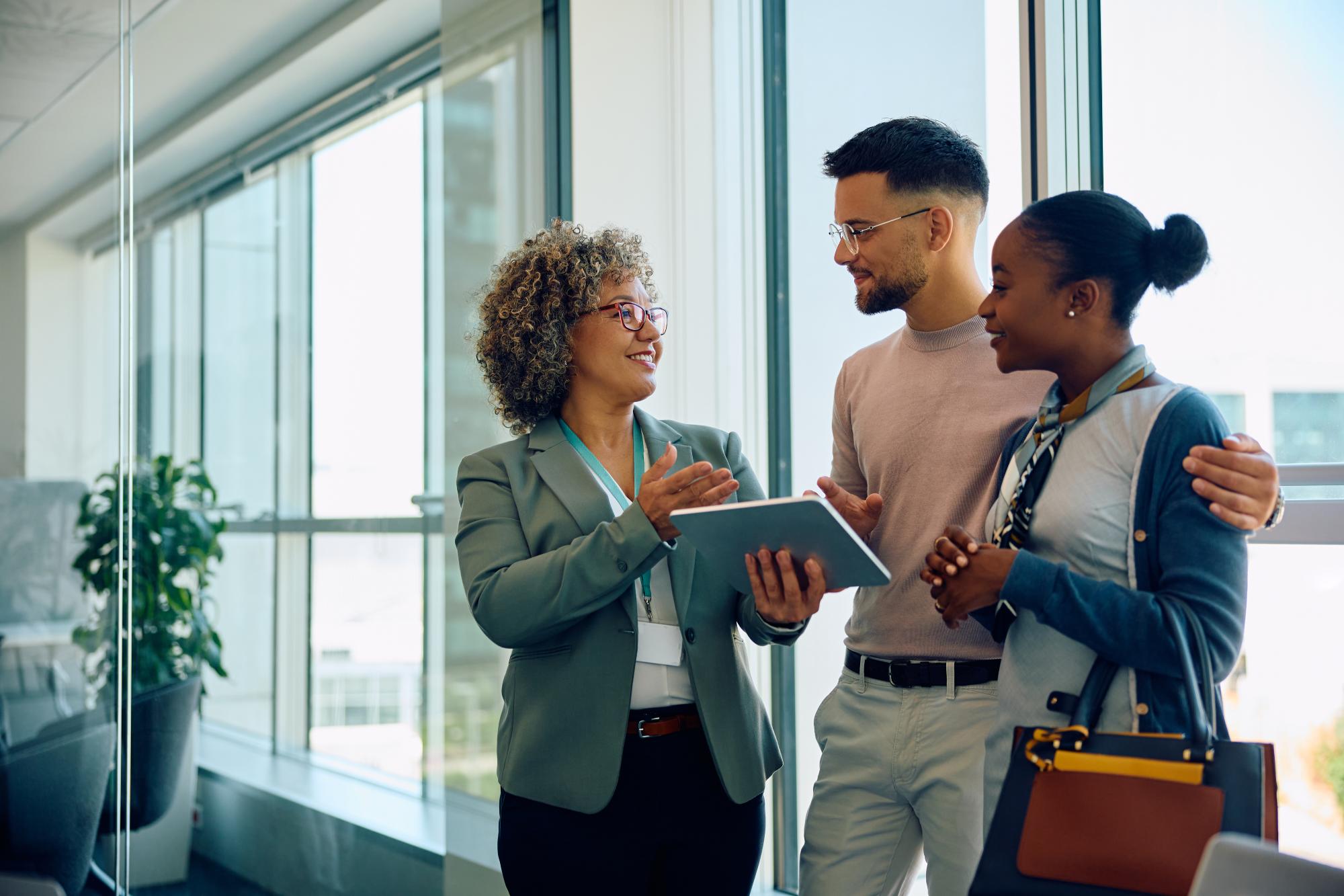 Financial advisor speaks to young couple